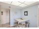 Cozy dining area featuring seating for four and stylish decor at 6285 Midnight Pass Rd # 403, Sarasota, FL 34242