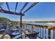 Exterior deck shows water views and patio seating at 6285 Midnight Pass Dr # 403, Sarasota, FL 34242
