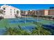 Overhead view of tennis and pickleball courts at community at 6285 Midnight Pass Dr # 403, Sarasota, FL 34242