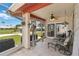 Inviting screened lanai providing a relaxing space with views of the community's landscaped lawn at 6615 12Th Ave W W Ave, Bradenton, FL 34209