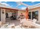 Charming enclosed patio featuring a dining area and comfortable seating, perfect for relaxing outdoors at 6615 12Th Ave W W Ave, Bradenton, FL 34209