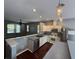 Open kitchen featuring stainless steel appliances and sleek countertops at 6711 Cambridge Park Dr, Apollo Beach, FL 33572