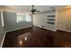 Spacious living room featuring dark hardwood floors and recessed lighting at 6711 Cambridge Park Dr, Apollo Beach, FL 33572