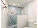 Modern bathroom with a stylish glass-enclosed shower featuring beautiful tile work and contemporary fixtures at 7100 Gulf Dr # 114, Holmes Beach, FL 34217