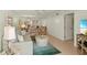 Cozy living space with comfortable seating, stylish decor, and a well-lit atmosphere for relaxation and socializing at 7100 Gulf Dr # 114, Holmes Beach, FL 34217