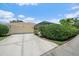 Well-maintained home exterior with a two-car garage, neat landscaping, and a driveway at 750 Anna Hope Ln, Osprey, FL 34229