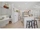 Well-lit kitchen with modern appliances, a breakfast bar, and plenty of cabinet and counter space for cooking at 750 Anna Hope Ln, Osprey, FL 34229