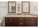 Bathroom with dual sinks, granite countertops, and modern fixtures at 7907 4Th W Ave # 7907, Bradenton, FL 34209