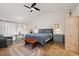 Comfortable bedroom featuring wood floors and stylish decor at 7907 4Th W Ave # 7907, Bradenton, FL 34209