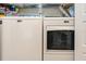 This laundry room includes a Maytag washer and dryer, making laundry tasks a breeze at 7907 4Th W Ave # 7907, Bradenton, FL 34209