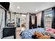 Cozy bedroom features natural light, a modern closet, and a view into the living space at 997 28Th Avenue E Dr, Bradenton, FL 34208