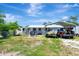 Exterior with a patio and covered parking for a boat and truck at 997 28Th Avenue E Dr, Bradenton, FL 34208