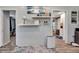 Well-lit hallway with stylish decor, seamlessly connecting different areas of the home at 997 28Th Avenue E Dr, Bradenton, FL 34208
