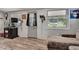 Comfortable living room area with a cozy couch and window views at 997 28Th Avenue E Dr, Bradenton, FL 34208