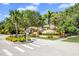 Inviting entrance to Park Trace with lush landscaping and a decorative sign at 104 Park Trace Blvd, Osprey, FL 34229