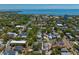 An aerial panorama presents the property with surrounding neighborhoods, water views, and a blend of city and nature at 1140 Oak Ne St, St Petersburg, FL 33701