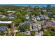 Overhead, this property boasts an ideal location with a blend of residential streets, mature trees, and distant ocean views at 1140 Oak Ne St, St Petersburg, FL 33701