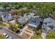 Aerial shot showing a home's positioning within a residential area, complete with tree-lined streets and neighborhood charm at 1140 Oak Ne St, St Petersburg, FL 33701