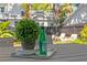 Close-up of backyard dining table with beverage and outdoor sitting area visible at 1140 Oak Ne St, St Petersburg, FL 33701
