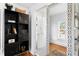 Well-lit bathroom with black and white tile floor and decorative mirror at 1140 Oak Ne St, St Petersburg, FL 33701