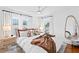 Bright bedroom with large windows, hardwood floors and stylish decor at 1140 Oak Ne St, St Petersburg, FL 33701