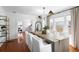 Stylish dining room with hardwood floors, a wooden table, and natural light at 1140 Oak Ne St, St Petersburg, FL 33701