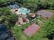 Aerial view of community amenities featuring a pool, playground, and sports courts at 11924 Persian Ter, Bradenton, FL 34212