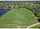 Aerial view of community soccer field, green space, and surrounding residences at 11924 Persian Ter, Bradenton, FL 34212