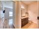 Well-lit bathroom featuring granite countertops, modern fixtures, and tile flooring at 11924 Persian Ter, Bradenton, FL 34212