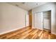 Spacious bedroom with wood floors, closet and a doorway at 11924 Persian Ter, Bradenton, FL 34212