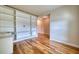 Living room with wood floors, built-in shelving and media storage at 11924 Persian Ter, Bradenton, FL 34212