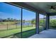 Screened patio with peaceful waterfront views and plenty of space for outdoor living at 11924 Persian Ter, Bradenton, FL 34212