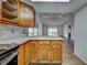 Bright kitchen features custom cabinets, modern appliances, and granite countertops for a luxurious cooking experience at 1211 Capri Isles Blvd # 26, Venice, FL 34292
