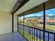 Screened patio overlooking pond and landscaped common areas at 1211 Capri Isles Blvd # 26, Venice, FL 34292