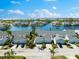 Overhead view of a waterfront community featuring lovely homes, well-kept landscaping, and serene water views at 1211 Spoonbill Landings Cir, Bradenton, FL 34209