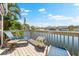 Enjoy the waterfront views from this home's private deck, perfect for lounging at 1211 Spoonbill Landings Cir, Bradenton, FL 34209