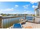 Relax on the deck with waterfront views, with lounge chairs and peaceful atmosphere at 1211 Spoonbill Landings Cir, Bradenton, FL 34209
