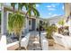 Inviting front entrance featuring tiled steps and mature landscaping at 1211 Spoonbill Landings Cir, Bradenton, FL 34209