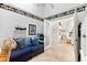 Cozy sitting area with comfortable sofa, nautical decor, and access to a bright, airy room at 1211 Spoonbill Landings Cir, Bradenton, FL 34209