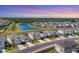 Community aerial view showcasing the neighborhood's layout and scenic pond views at 13013 Oak Hill Way, Parrish, FL 34219