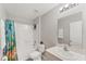 Bathroom with shower/tub combo, single sink vanity, and neutral color scheme at 13013 Oak Hill Way, Parrish, FL 34219