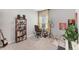 Bright bedroom featuring a desk, shelving and natural light from the window at 13013 Oak Hill Way, Parrish, FL 34219