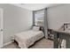 Bedroom with twin bed, carpeted floor and neutral color scheme at 13013 Oak Hill Way, Parrish, FL 34219