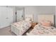 Bedroom with twin beds, carpeted floors, closet and neutral color scheme at 13013 Oak Hill Way, Parrish, FL 34219