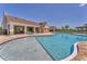 Community pool features a zero entry point, sun shelves, and an outdoor lounge area at 13013 Oak Hill Way, Parrish, FL 34219