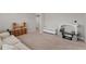 Spacious living room offering plush carpets with light streaming through the window at 13013 Oak Hill Way, Parrish, FL 34219
