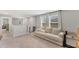 Spacious living room featuring neutral colors, plush carpeting and lots of natural light at 13013 Oak Hill Way, Parrish, FL 34219