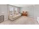 Bright living room with plush carpeting and neutral decor provides a cozy atmosphere at 13013 Oak Hill Way, Parrish, FL 34219