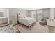 Comfortable main bedroom with a bed, sitting area, and an en suite bathroom at 13013 Oak Hill Way, Parrish, FL 34219
