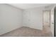 Cozy bedroom with neutral carpet, closet, and doorway to the hallway at 13116 Bayberry Way, Parrish, FL 34219